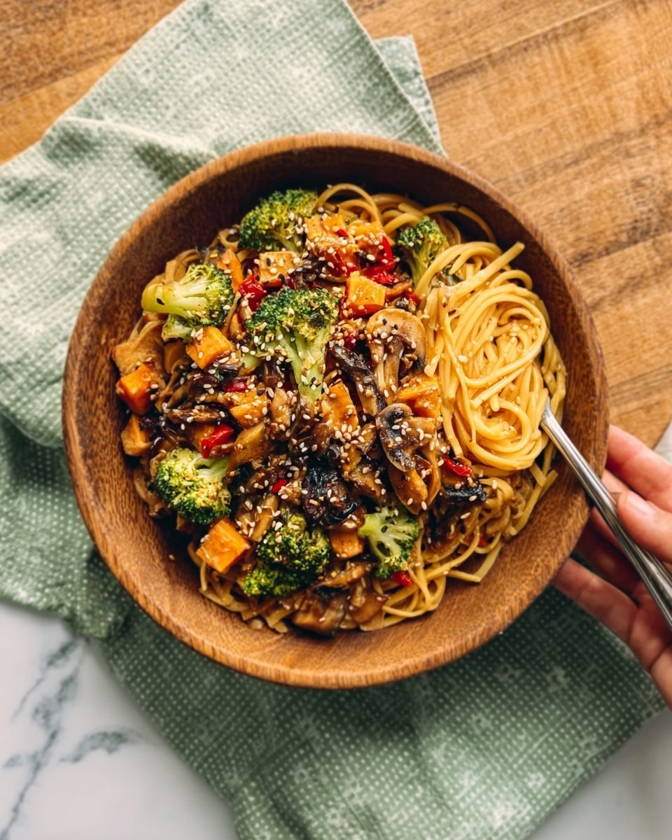 The image shows a wooden bowl filled with noodles mixed with colorful vegetables in layers. The bottom layer is thin brown noodles, topped with chopped green broccoli, orange carrot pieces, and small red bell pepper slices. There are also some sesame seeds sprinkled on top, and the texture looks glossy and well-cooked. A silver fork is placed inside the bowl on the right side. The bowl is sitting on a light green cloth on top of a wooden surface, changed to a white marbled texture. photo taken with an iphone --ar 4:5 --v 7
