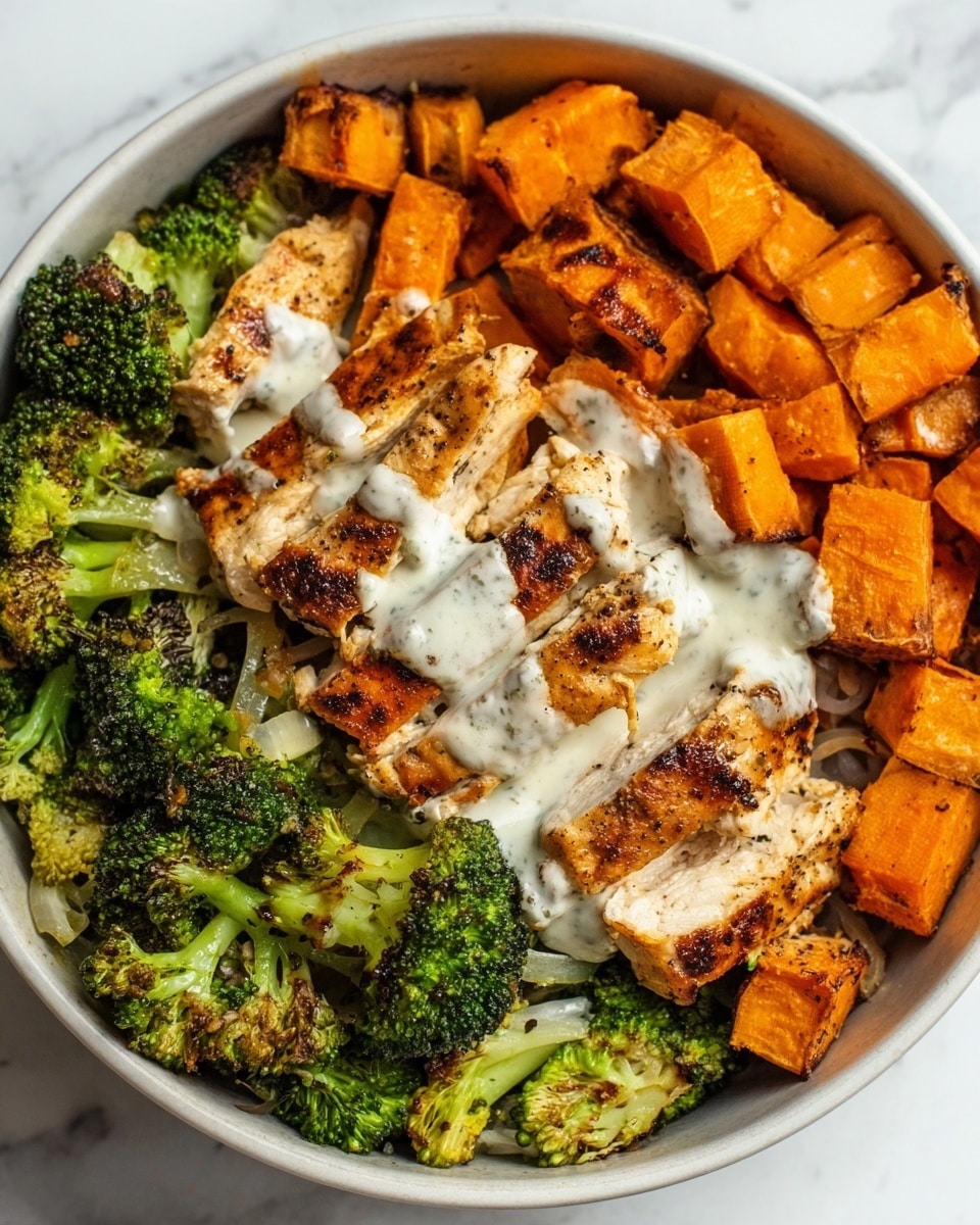 A white bowl contains a colorful layered dish placed on a white marbled surface. The bottom layer is made of cubed orange sweet potatoes, roasted with a slightly crispy texture and some char marks. On one side, there are bright green steamed broccoli florets with a fresh and soft look. In the center, grilled chicken slices with grill marks form the next layer, topped with a drizzle of creamy white sauce that adds a smooth texture. The overall look is fresh and well-arranged, with the colors and textures clearly separated. photo taken with an iphone --ar 4:5 --v 7